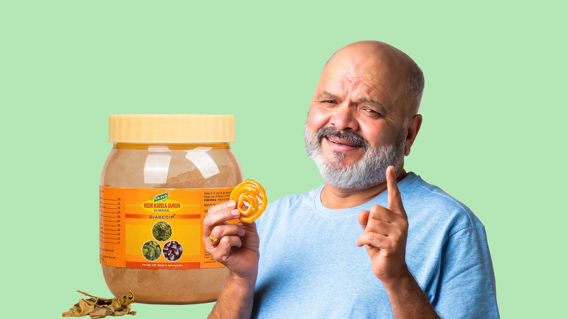 a Man holding a funnel cake, smiling as he stands beside karela jamun powder